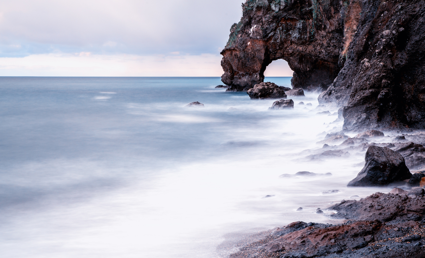 Waves crashing onto rocks
