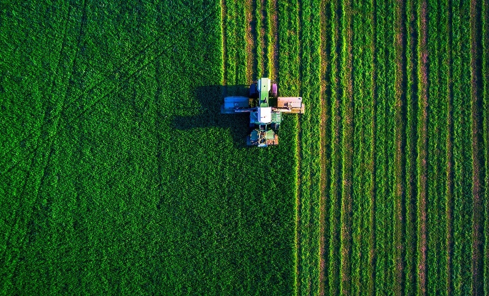 Agriculture tractor field plowing 2