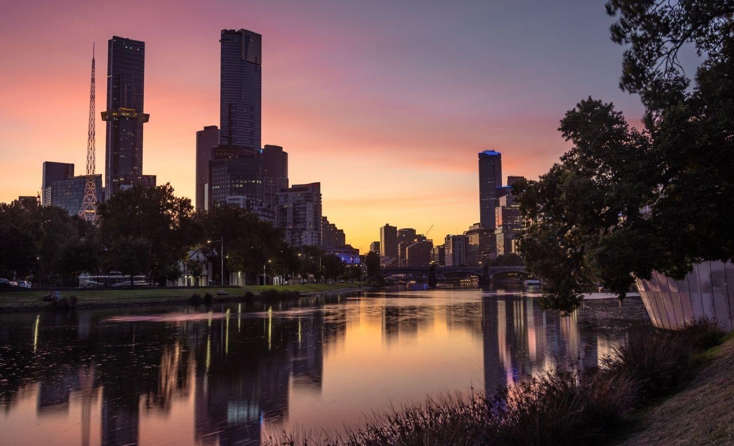 Sunset buildings over water
