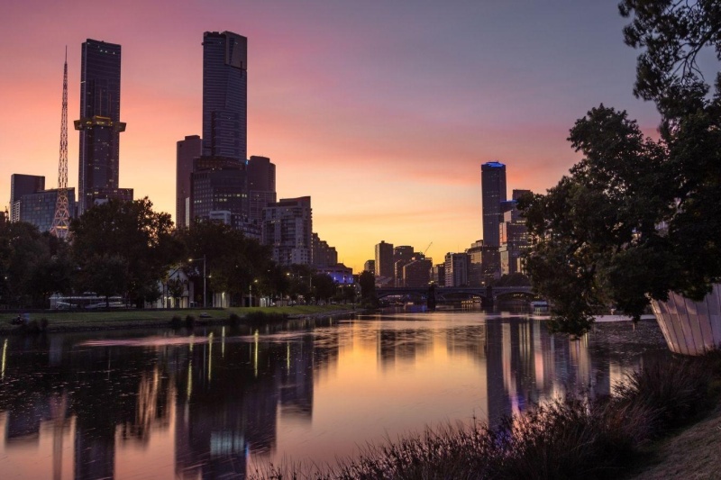 Sunset buildings over water