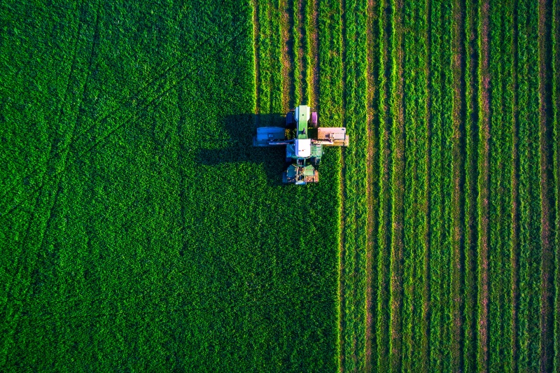 Agriculture tractor field plowing 2